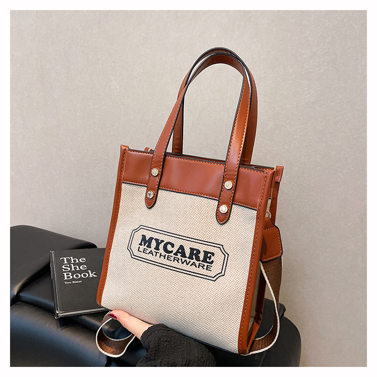 Nuevo cross-border bolso de empalme de color para mujeres 2025 verano lienzo de moda mochila de hombro simple bolsa de viaje image 7