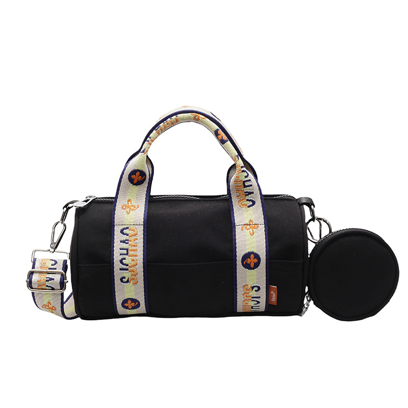 Oxford tela de contraste de color ligero bolso cilíndrico de mano casual para mujeres 2025 nuevo alto valor ocio transporte de viaje mochila