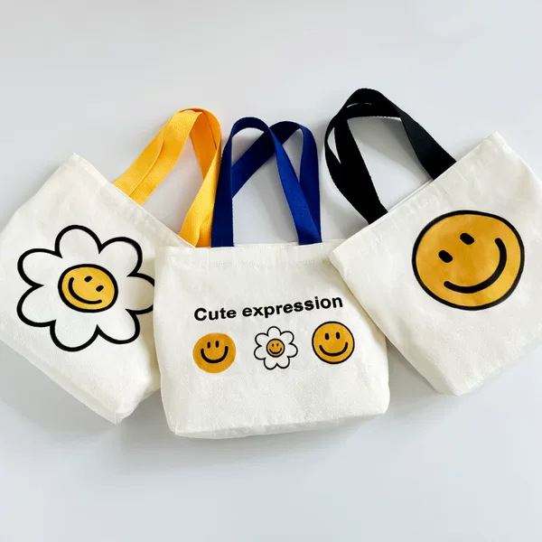 2025 New Bag Women's Cute Smiley Flower Canvas Bag Summer Travel Handbag Student Korean Lunch Bag