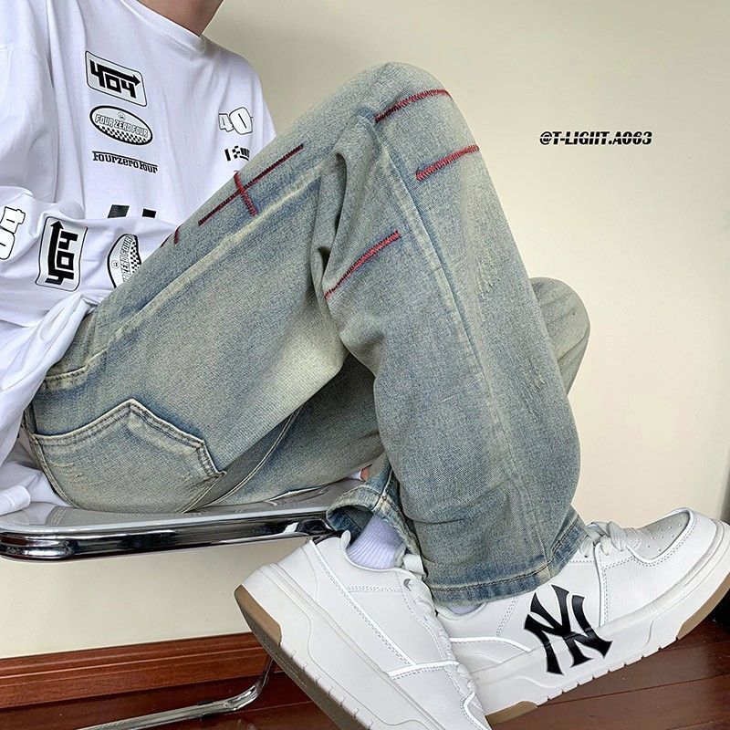 Nuevo producto Trend American White Retro Bordado Scratch Old Jeans Pantalones sueltos Hombres y mujeres Trendy Long