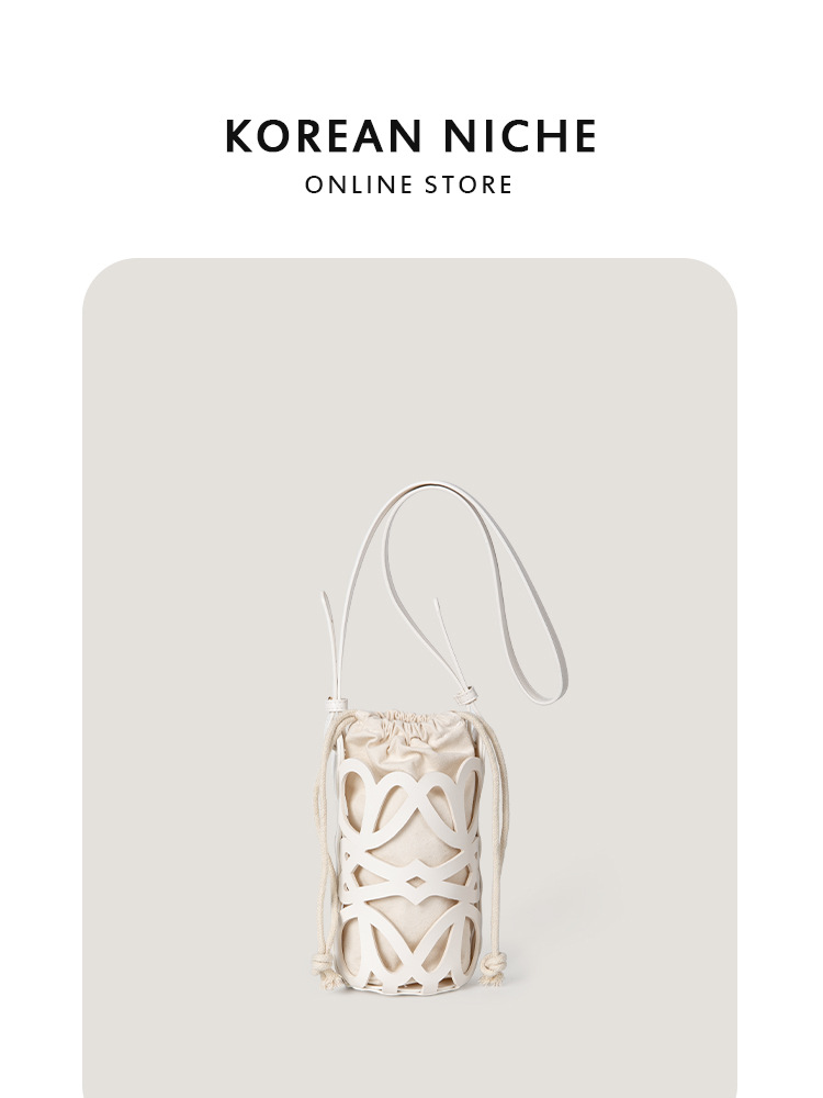 Nuevo bolso bandolera cilíndrico de lona con cordón y diseño coreano de nicho, para mujer, de alta gama, único y versátil.