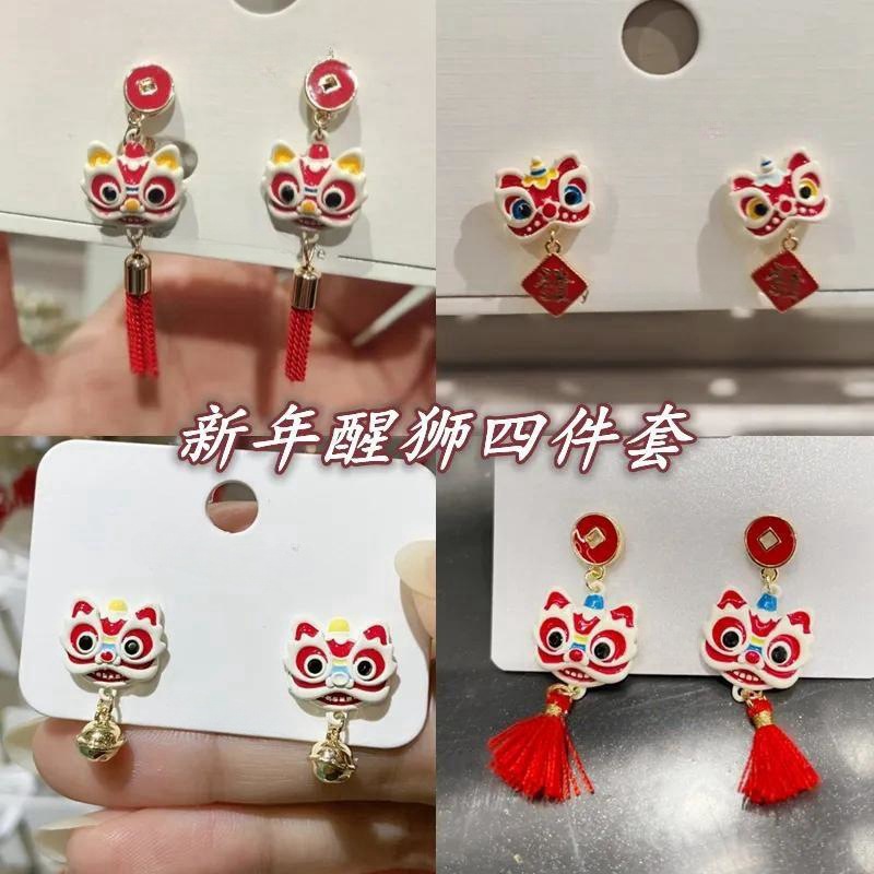 Red asymmetrical earrings