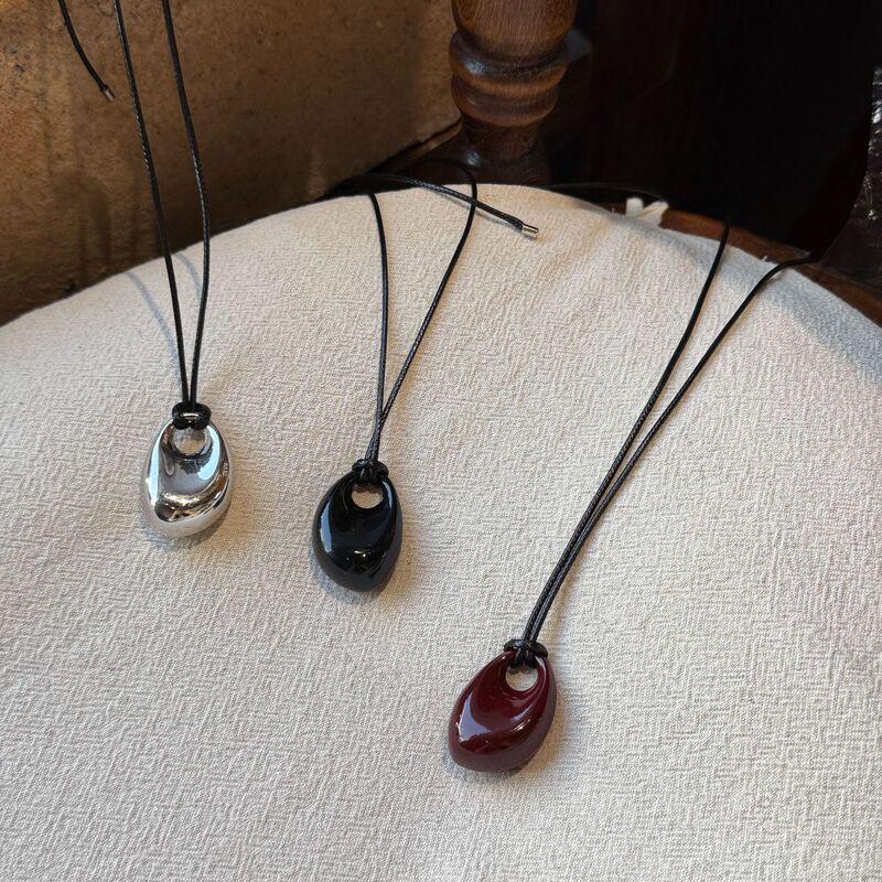 South Korea blogger with three-color silver pendant black rope long niche design high-end niche solid sweater chain