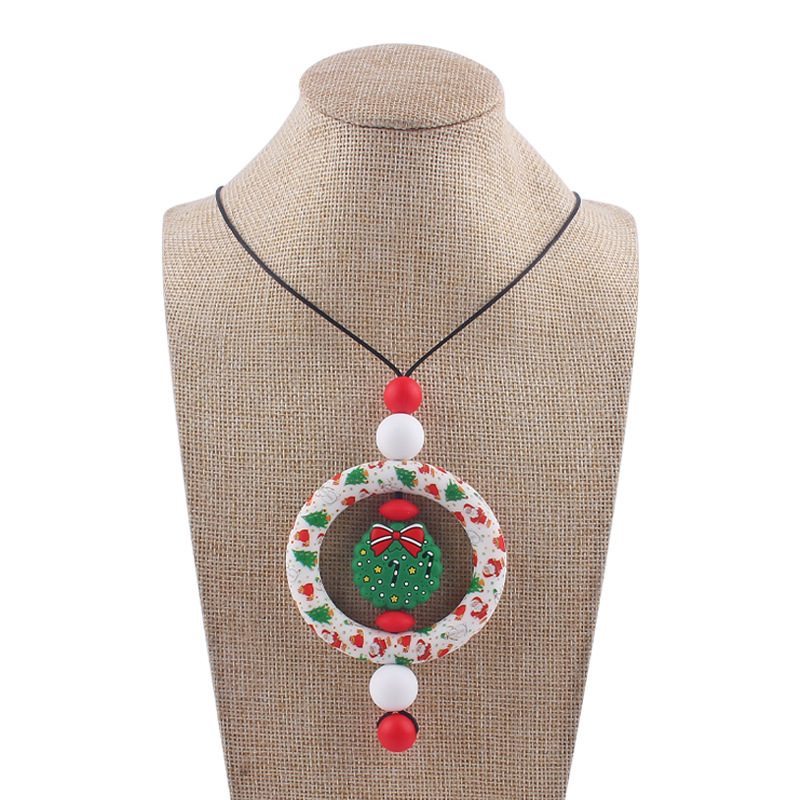 Bebé de dibujos animados de Navidad collar bebé creativo de silicona Santa Claus mordedura COLLAR COLGANTE hecho a mano