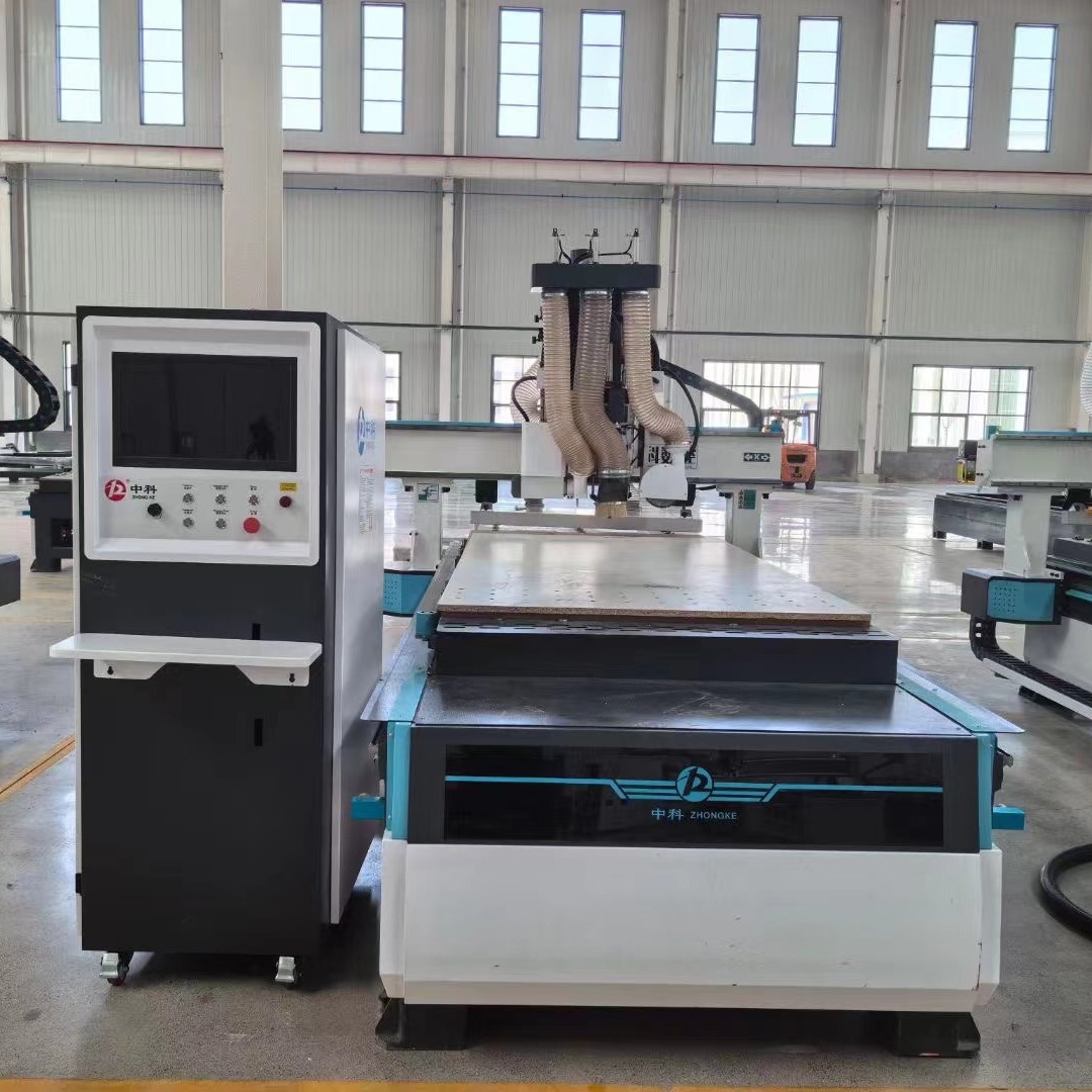 全自动换刀排钻包加工中心开料机木工加工机械吸塑门板造型下料机