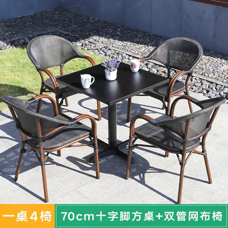 Mesa y silla al aire libre leche tienda de té cafetería silla de malla Silla de ratán Patio de tres piezas balcón mesa y silla de ocio al aire libre