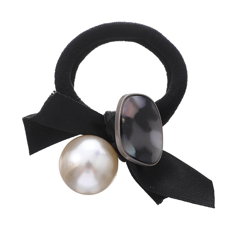 Arco negro coreano anillo de cabello de perla banda elástica de alta elasticidad para mujeres 2025 nuevos adornos de cabello de cabello de cuerda de cabeza