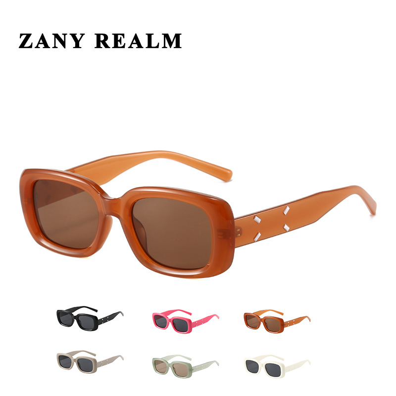 Xiaohongshu mismo estilo personalidad gafas de sol de montura pequeña gafas de sol de moda hip-hop nuevo color caramelo street shooting versión coreana al por mayor