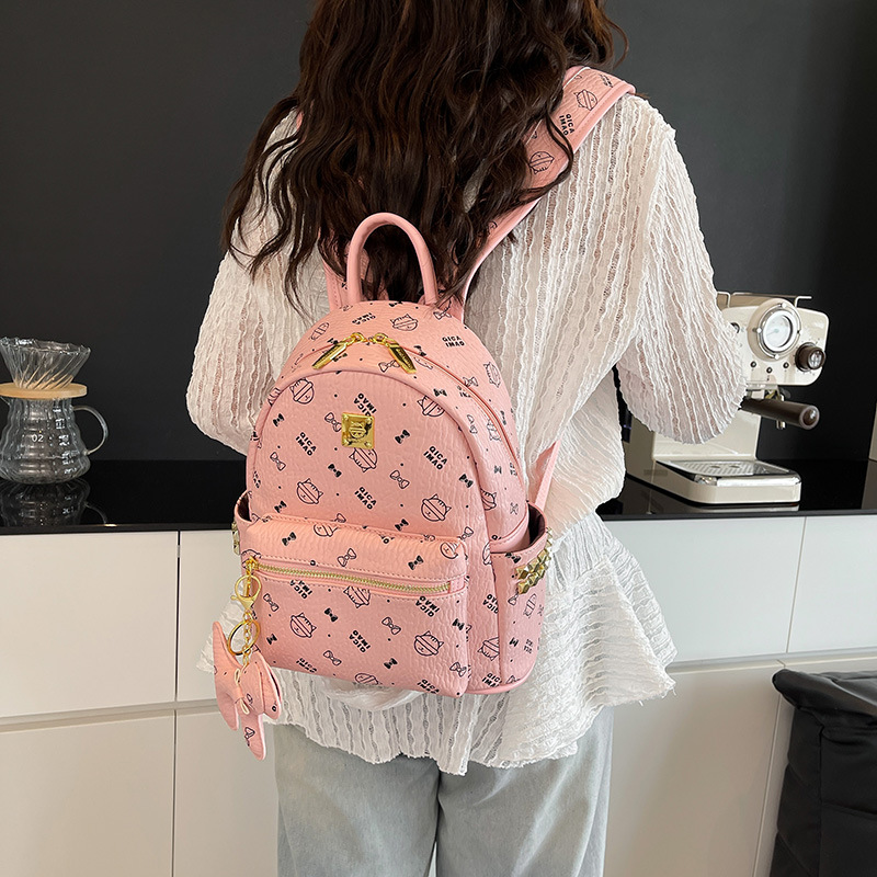 2025 nuevas mochilas escolares para estudiantes universitarias, lindos gatitos, mochilas para damas, bolsos de comercio exterior de gran capacidad para el trabajo y los desplazamientos