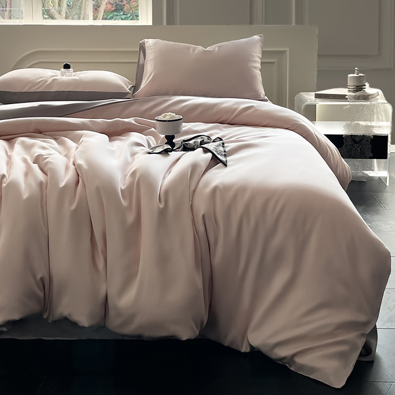 Juego de cama de verano de cuatro piezas de seda de hielo de lujo ligero 2025 nueva funda de edredón sábana sábana sábana ropa de cama desnuda sedosa