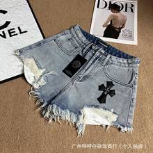 25春夏新款美式辣妹做旧破洞流苏十字皮标牛仔热裤