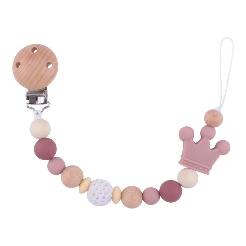 Nuevo bebé suministros Beech chupete clip DIY corona de dibujos animados mordedura de silicona molares chupete cadena anti-caída