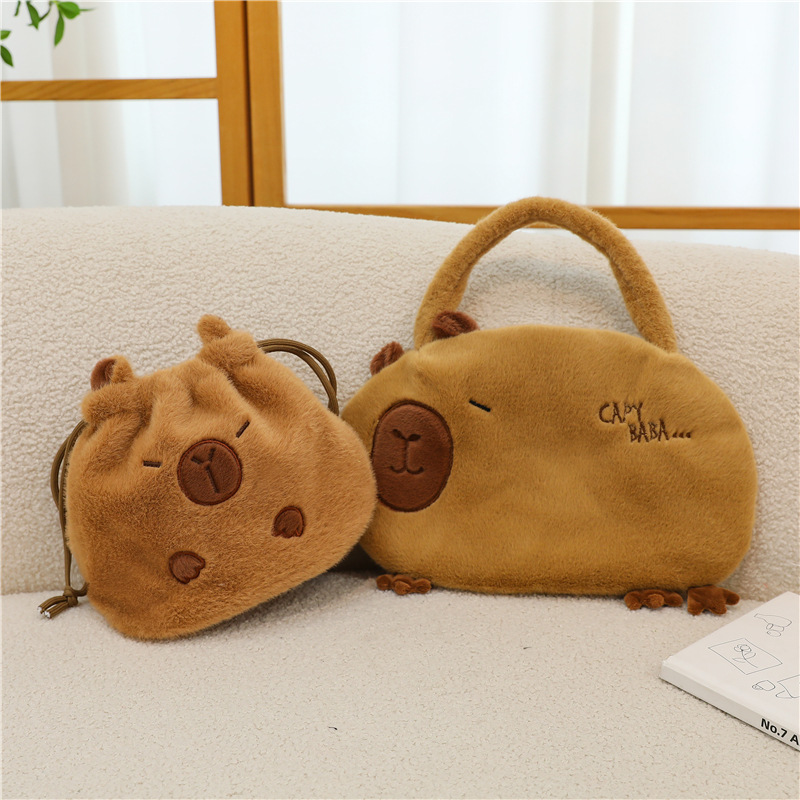 Bolso de peluche en línea para mujeres 2025 nuevo bolso de muñeca Capibara, bolso de cubo de mano lindo corazón de niña