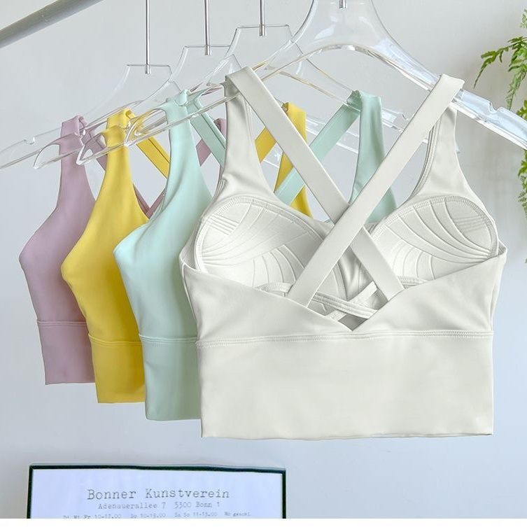 Una sola ropa interior deportiva femenina corrida a prueba de choque ventilada hermosa espalda taza completa ropa de yoga sostén chaleco fábrica de comercio exterior