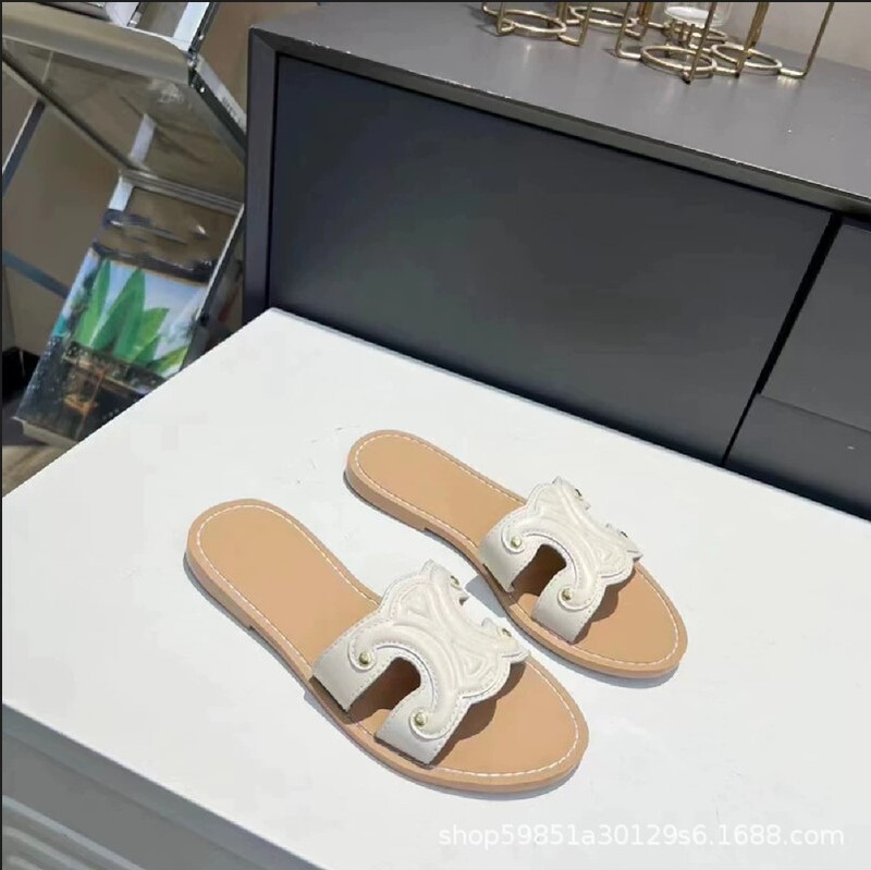 高バージョンの夏の新型の茶色のエンボスのフラットスリッパの女性の本革のファッションの外は丸い頭の1字の牛革を着て涼しいです。|undefined
