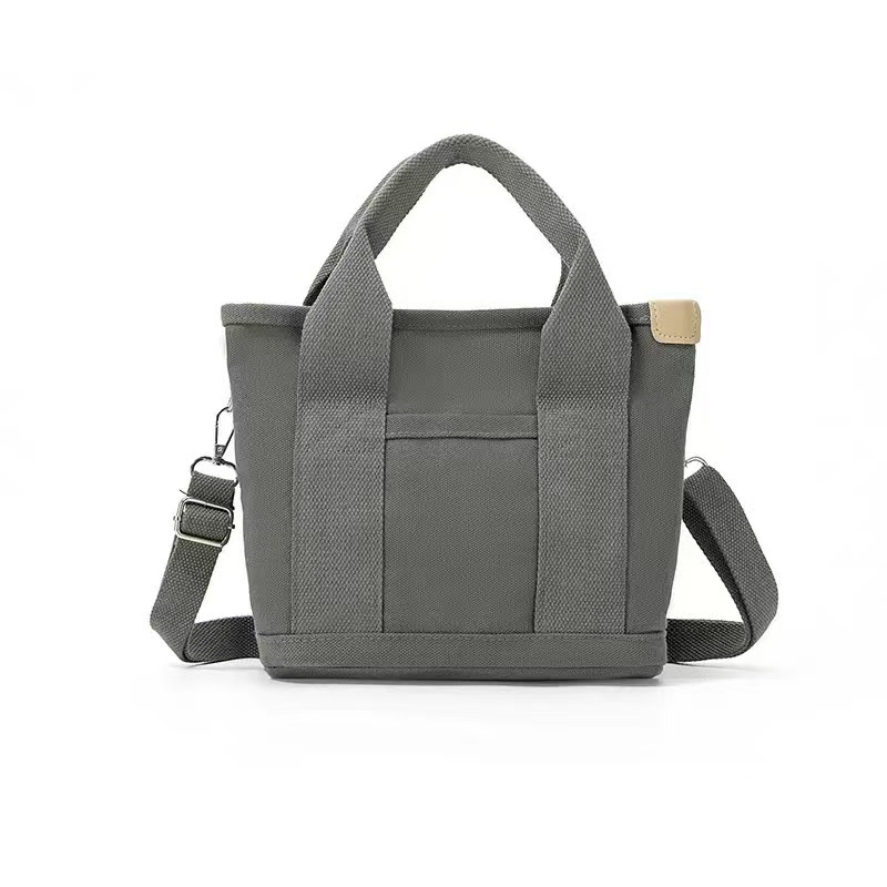 高颜値新型日系キャンバスバッグファッションシンプル大容量手提げ袋日常通勤多目的弁当バッグ女