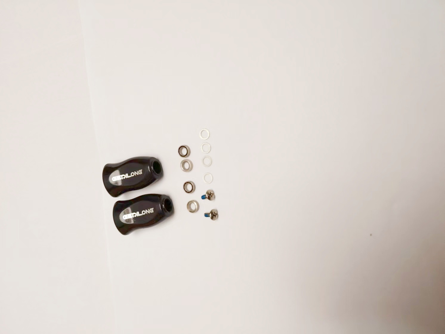 2 black grip pills + 4 free bearings + 4 spacers