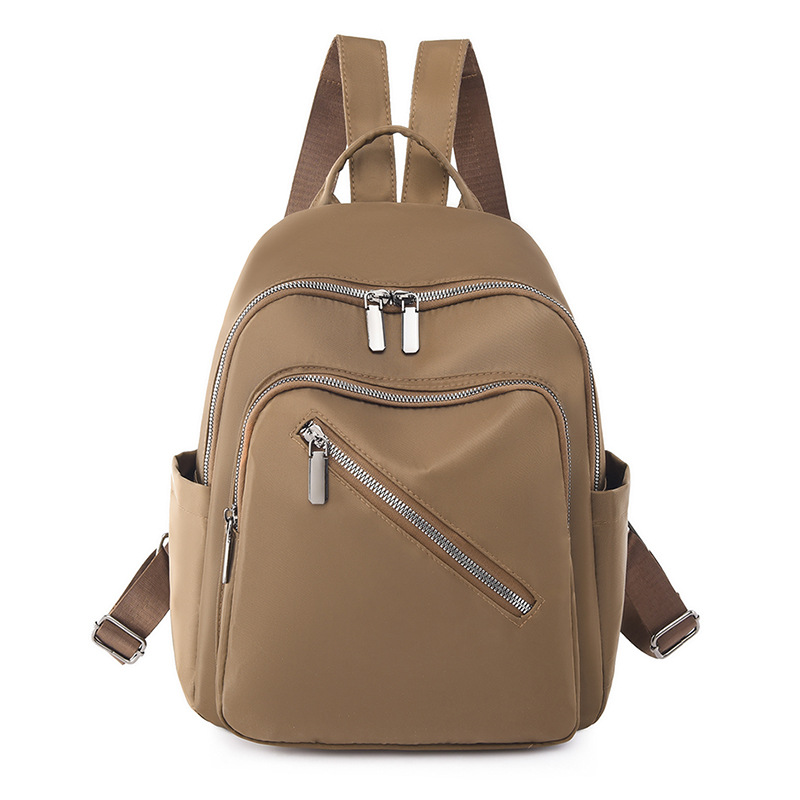 Comercio exterior al por mayor 2023 nueva mochila de nailon casual para mujer, mochila de viaje al aire libre literaria simple, mochila escolar