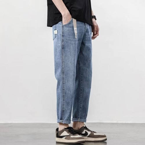 Slim-fit straight-leg men's jeans for spring and summer, Korean-style, loose and comfortable with a slight flare, versatile and trendy casual pants.