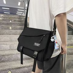 シンプルな男子学生のカジュアルなショルダーバッグファッション韓国系キャンバスのショルダーバッグのカップルのリュックサックの新型卸売り