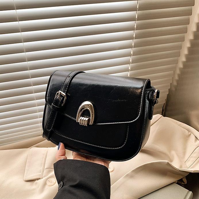 Simple bolso de silla de ocio retro mujer 2025 nuevo estilo extranjero bolso de hombro universal de moda bolso de mochila