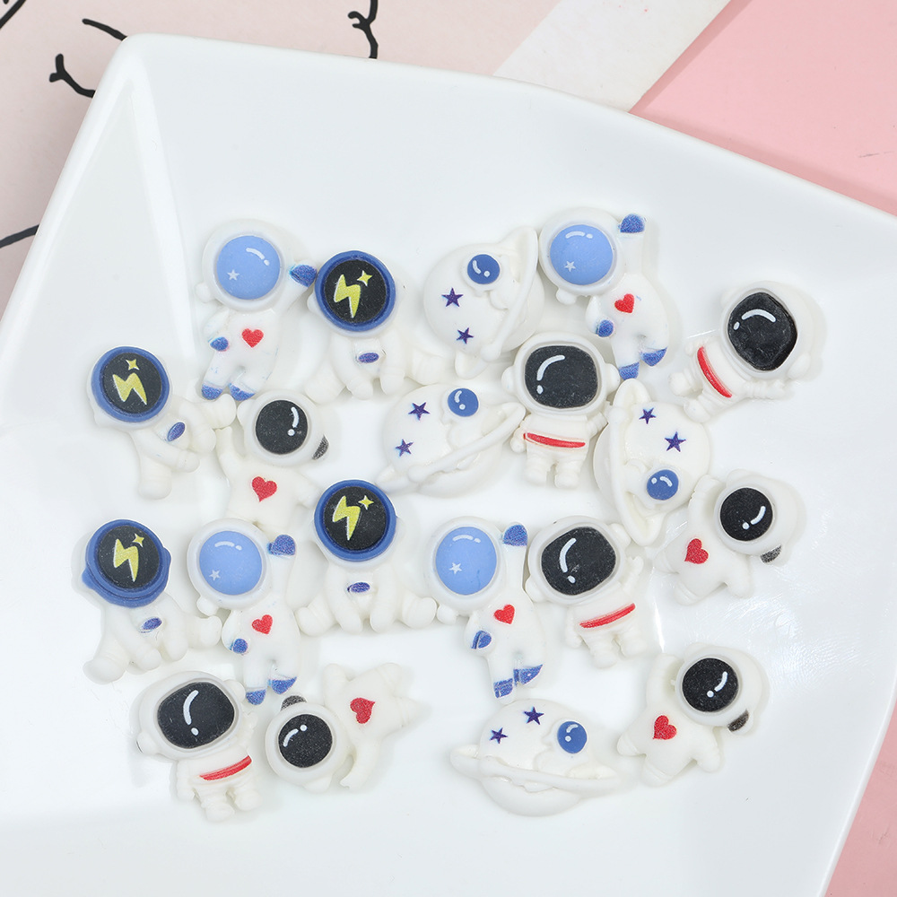 Espacio transfronterizo astronauta DIY resina accesorios DIY crema pegamento caja del teléfono accesorios para el cabello taza de agua pegatinas caja de almacenamiento parche