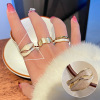 Retro fashionable ring, silver 925 sample, on index finger