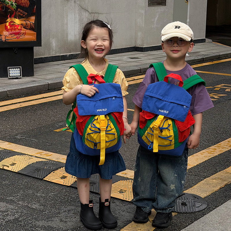 Mochila de cuerda de tracción de gran capacidad para niños y niñas, color de contraste de color, mochila escolar para estudiantes de primaria 2026 nueva mochila infantil