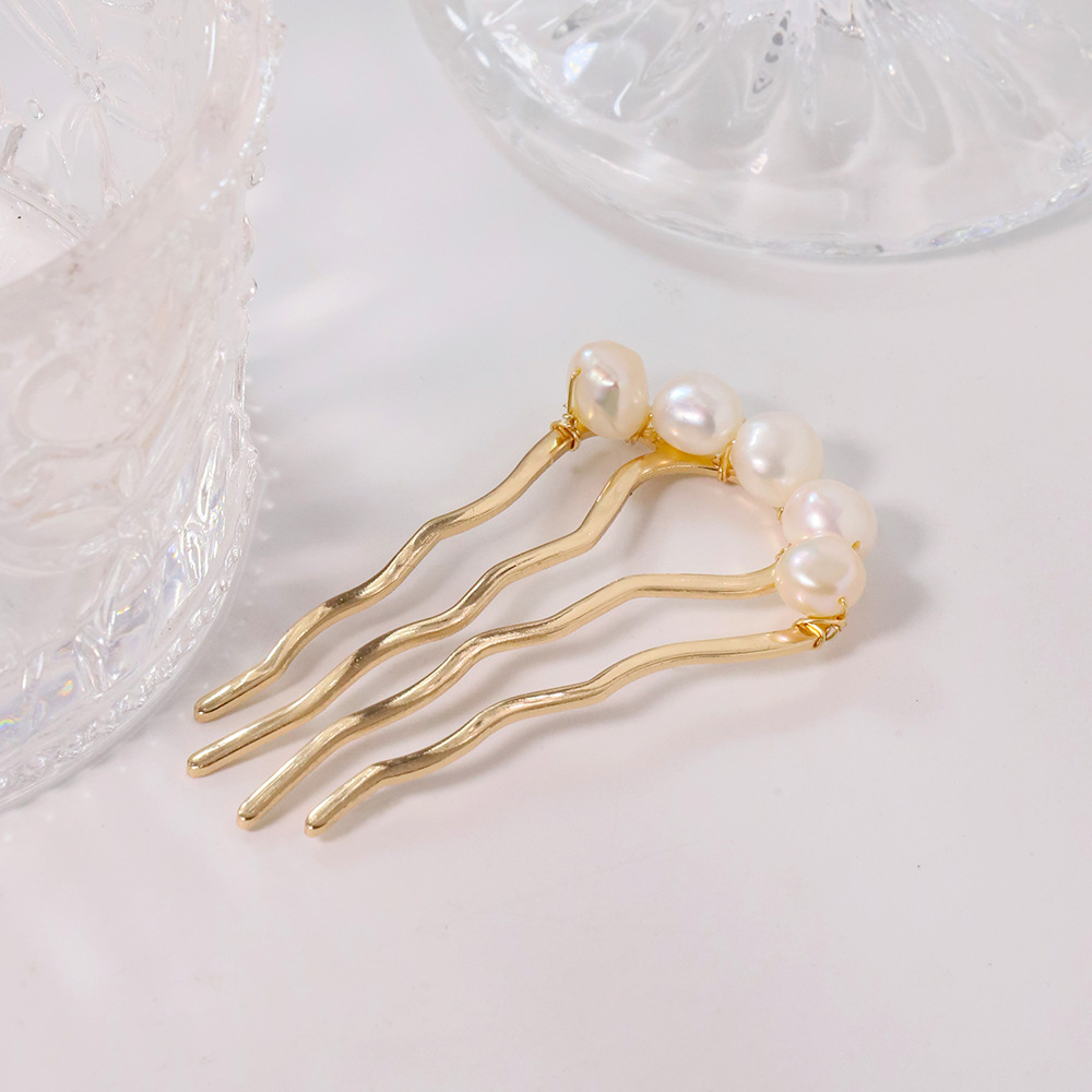 Perla de alta sensación en forma de U clip de cabello bola cabeza fija artefacto clip de cabello nuevo peine de cuatro dientes joyas al por mayor image 5
