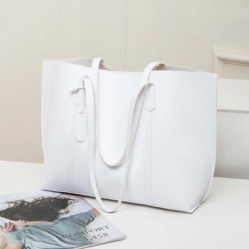 2025 otoño y invierno nuevo nicho Zhong tote bolso de cuero suave de gran capacidad para mujeres bolso de viaje de alta calidad bolso de hombro ocio