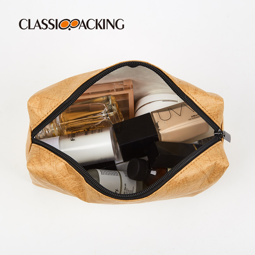 Bolsa de almacenamiento de papel DuPont de tres piezas al por mayor de fábrica Bolsa de cosméticos impermeable resistente al desgaste multifuncional simple con logotipo impreso