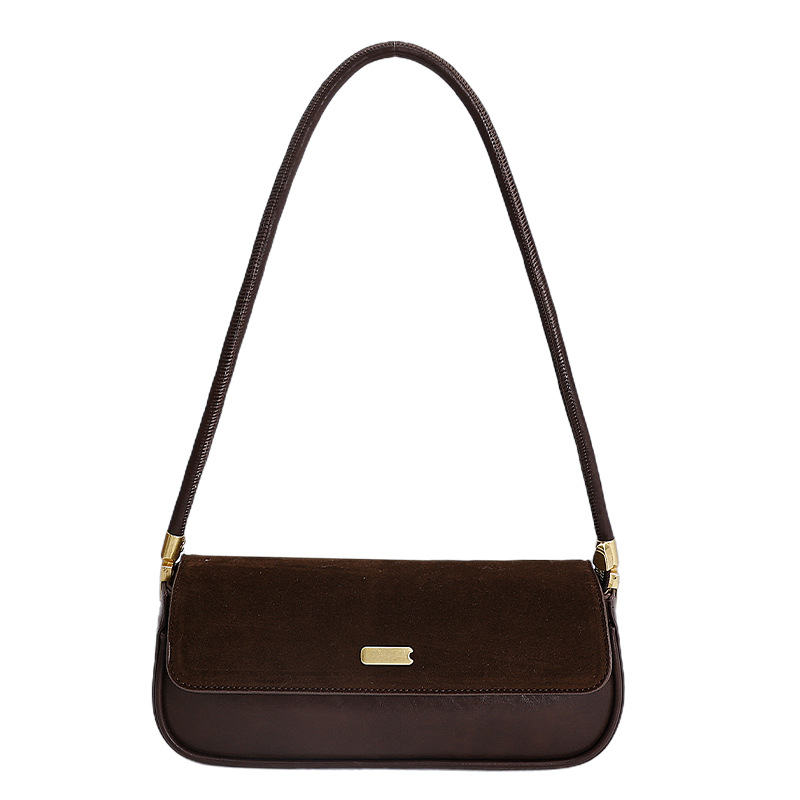 Bolsas de brazo retro de moda transfronteriza mujeres 2025 invierno nuevo estilo francés nicho bolsas de palo de moda bolsas de hombro casuales