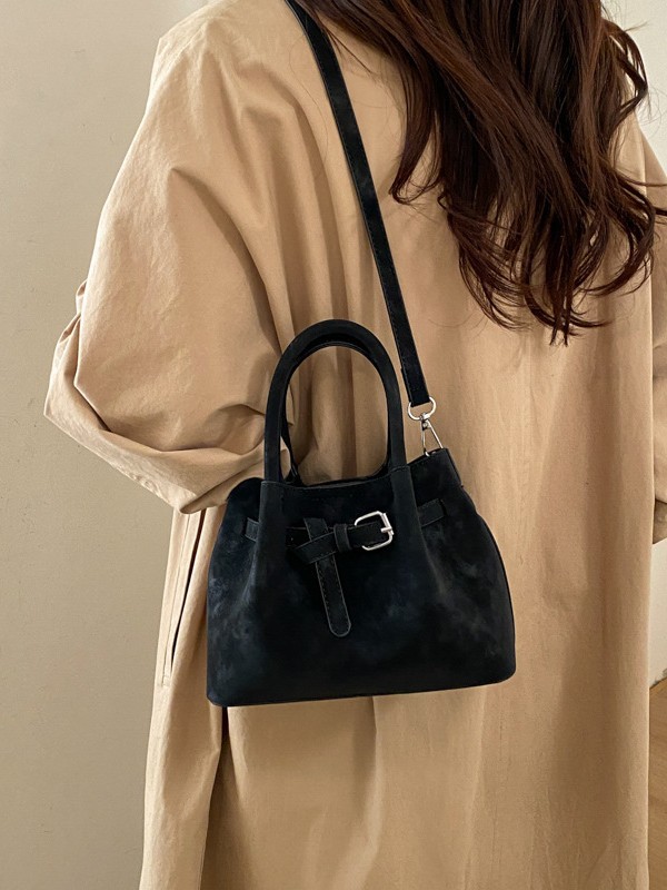 Diseño de nicho simple bolso de cubo portátil para mujeres 2026 nuevo estilo coreano de textura de alta calidad casual versátil bolso de tramo inclinado
