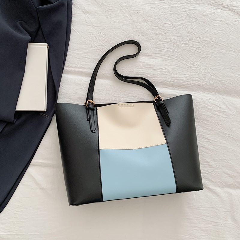Bolso de cercanías atmosférico para mujer, estilo occidental de gran capacidad 2025 verano nuevo estilo retro simple bolso portátil de un solo hombro para mujer