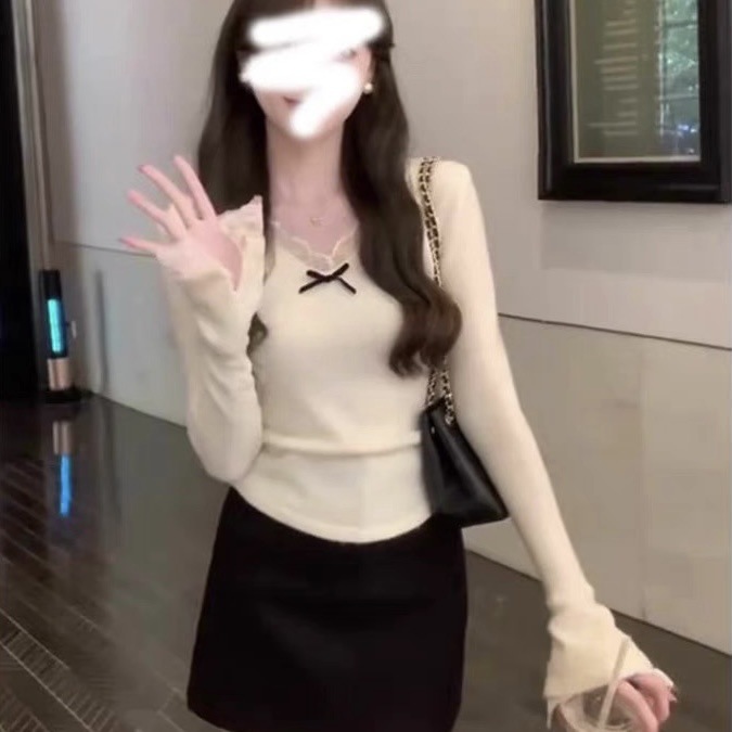 フランス式の純粋なレースの辺のラッパの袖のvネックの底のシャツの女性の秋冬のデザイン感の小さい大衆の内はニットの上着を掛けます