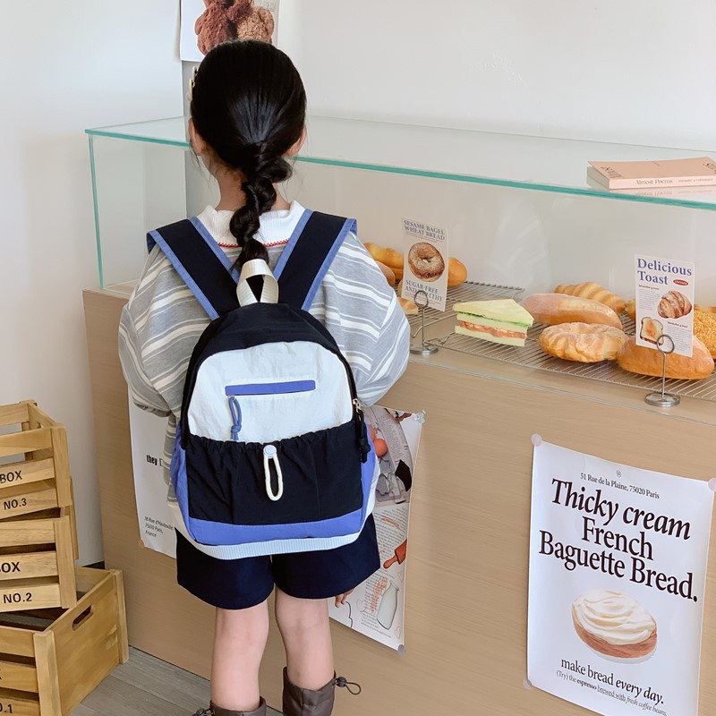 Mochila de estudiantes de escuela primaria de gran capacidad, moda coreana, mochila para niños y niñas, nueva mochila para niños de comercio exterior transfronterizo.