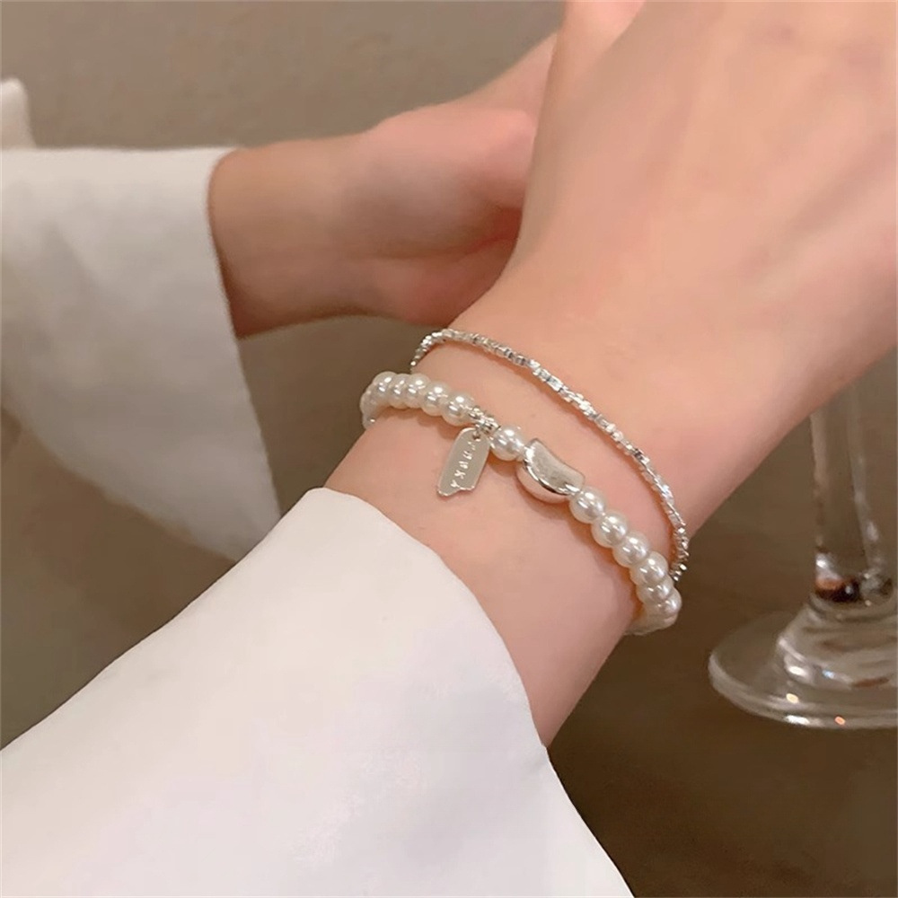 高級感碎銀子珍珠手鍊女2024年新款小眾設計輕奢精緻疊戴手串配飾