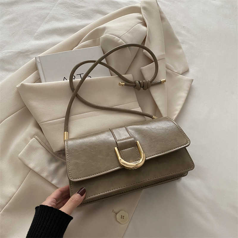 Diseño francés de nicho retro bolso debajo de la axila para mujeres 2024 otoño y invierno nuevo paquete de mano de hombro de alta calidad