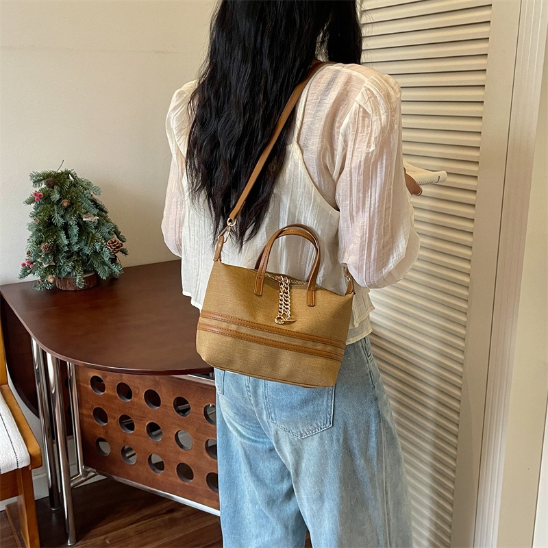 Bolsa de lona popular para mujeres coreanas nuevo estilo de viaje retro estilo exterior ocio bolso de mano diario marrón medio