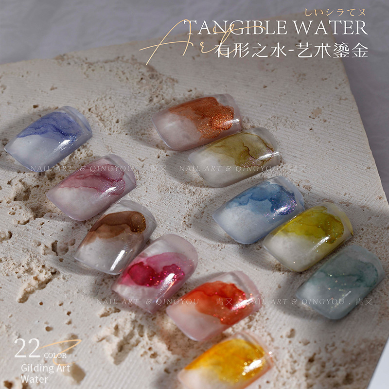 Manicura de secado rápido acuarela difuminado líquido perlado degradado tinta blanca dorada humo fototerapia mármol especial