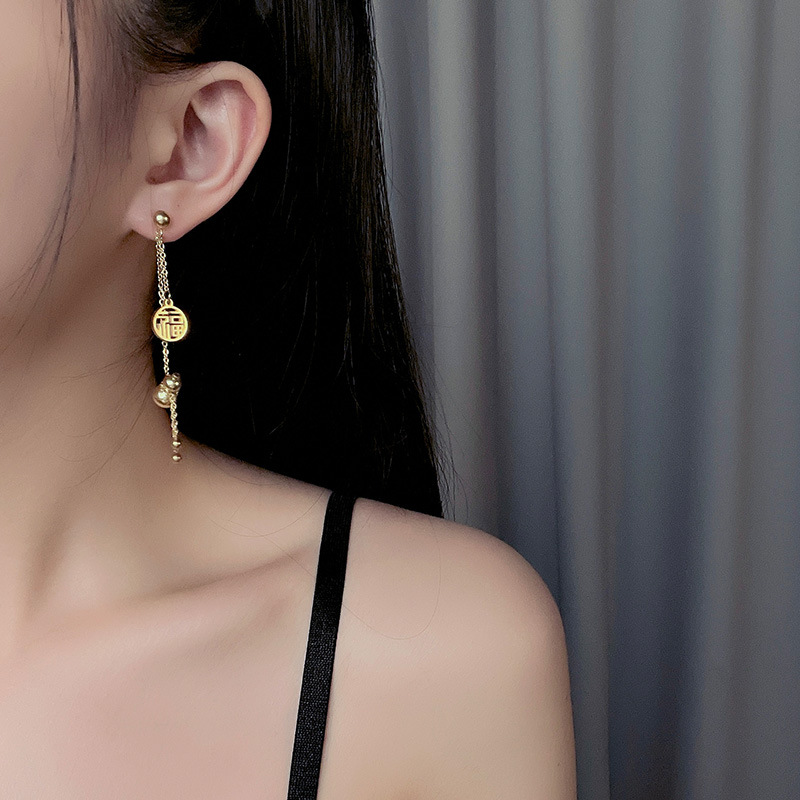 Pendientes de estilo étnico de la mujer pendientes largos de la borla del diseñador único nicho pendientes de temperamento retro pendientes