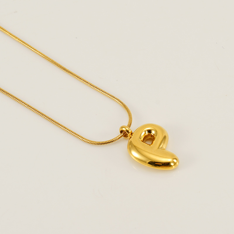 Burbujas transfronterizas 26 letras inglesas colgante brillante collar nicho universal oro acero titanio joyería collar