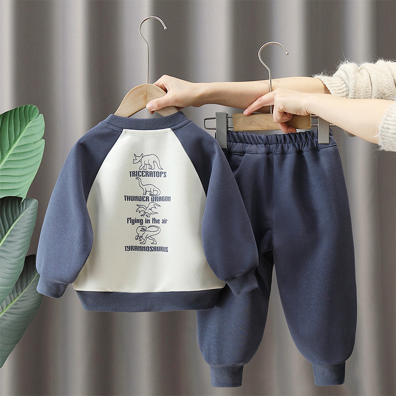 7105 traje de primavera para bebés 2025 nuevo suéter de manga raglán de dibujos animados para niños de dos piezas de primavera y otoño
