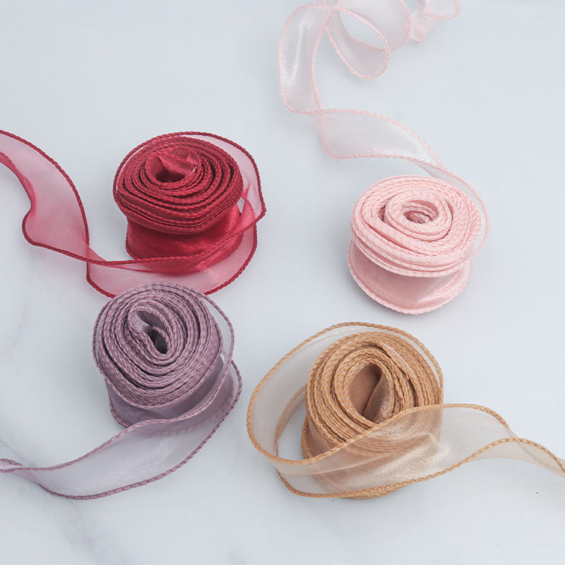 Fábrica en stock Venta caliente 4cm hilado curvado con flores material de embalaje de regalo con cinta de flores elegante hilo de cola de pescado