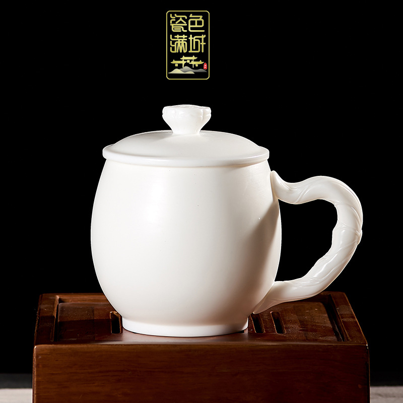 Porcelana color Mancheng Dehua porcelana blanca con tapa filtro oficina con revestimiento de separación taza de agua taza de té grande de cerámica personal