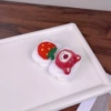 White bracelet, strawberry