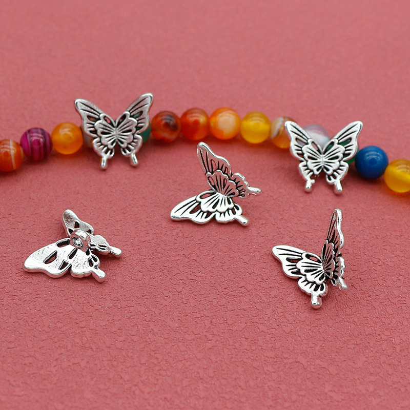 Antique three-dimensional butterfly Xizang silver pendant necklace bracelet ring alloy pendant pendant DIY jewelry accessories