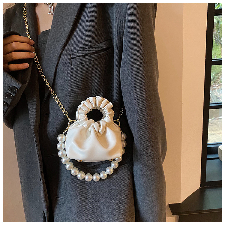 255g Weight Beading, Pearls Fashion Element Clasp Frame Closure Type Top Handle, Chain Strap Type Crossbody Bag Bags Type Casual, Daily, Shopping Occasion Pu Leather Material Solid Color Pattern All Seasons Season Kid'S Gender Cute Style Bucket Shape Kid'S Pu Leather Solid Color Cute Beading Pearls Bucket Clasp Frame Crossbody Bag 57