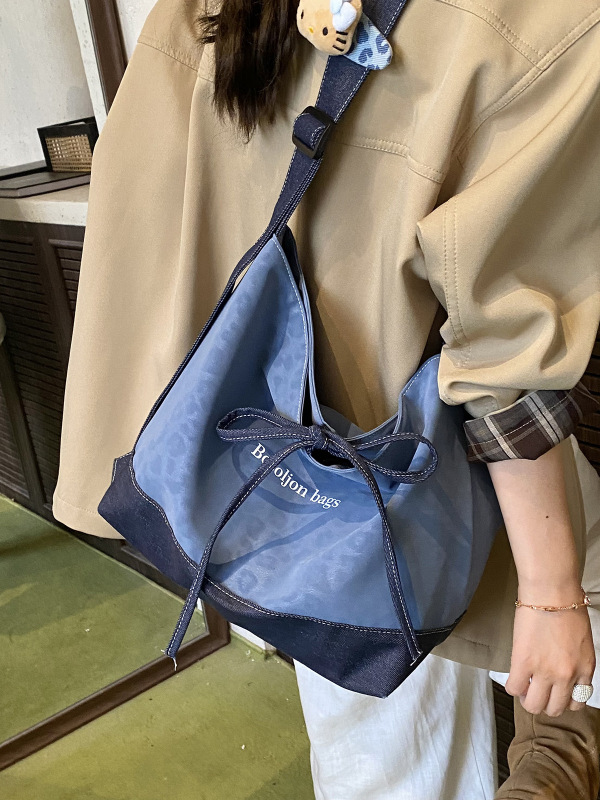 通勤大学生斜挎包女2025新款轻便百搭单肩包松弛感豹纹托特水桶包|undefined