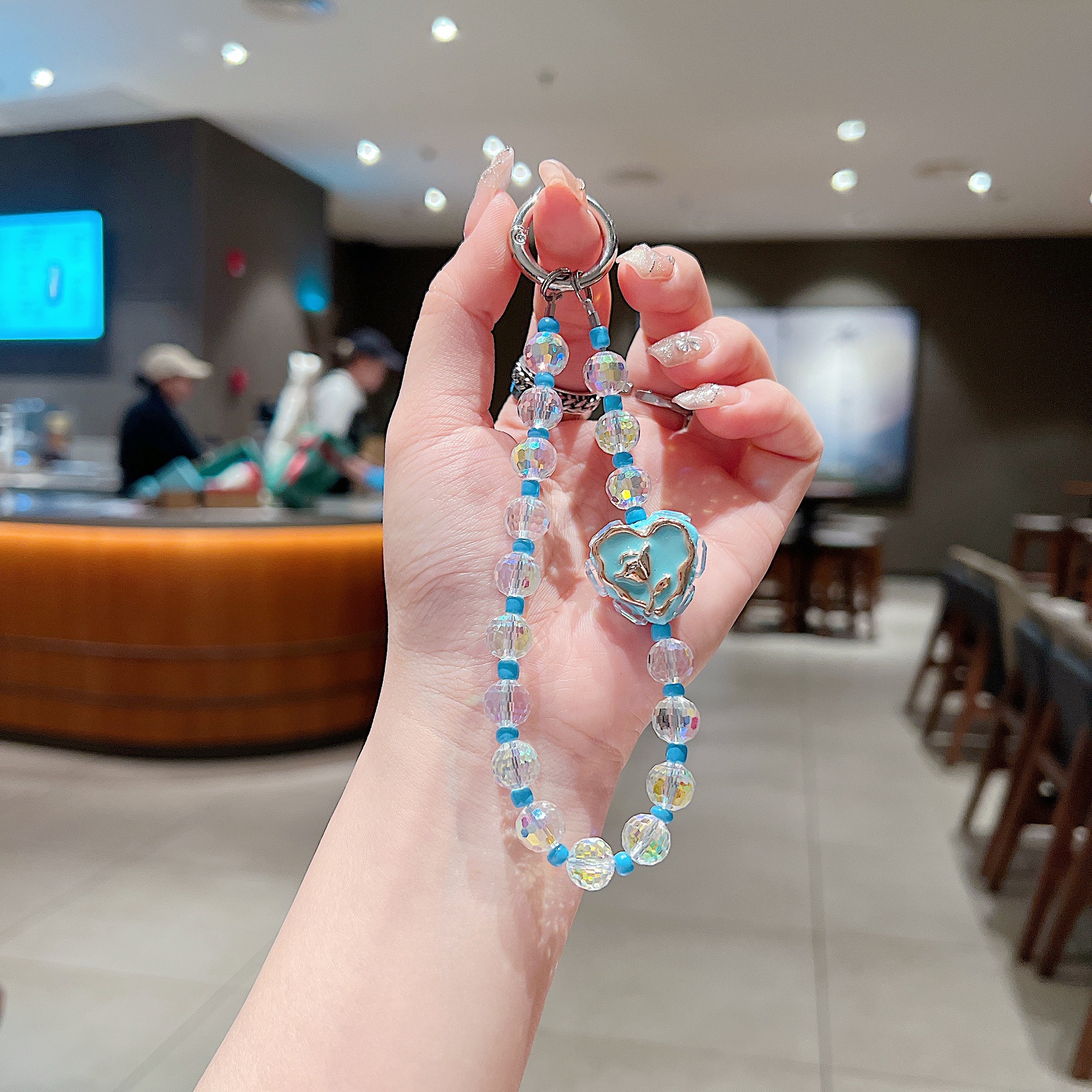 Verano pequeño y fresco cordón de cadena de teléfono móvil cristal colorido accesorios creativos amor flor pintada cordón de hebilla de metal